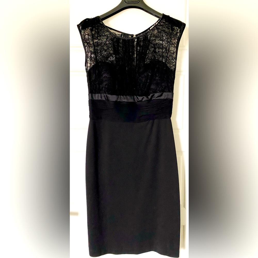 This is a stunning dress, worn only once and in pristine condition!